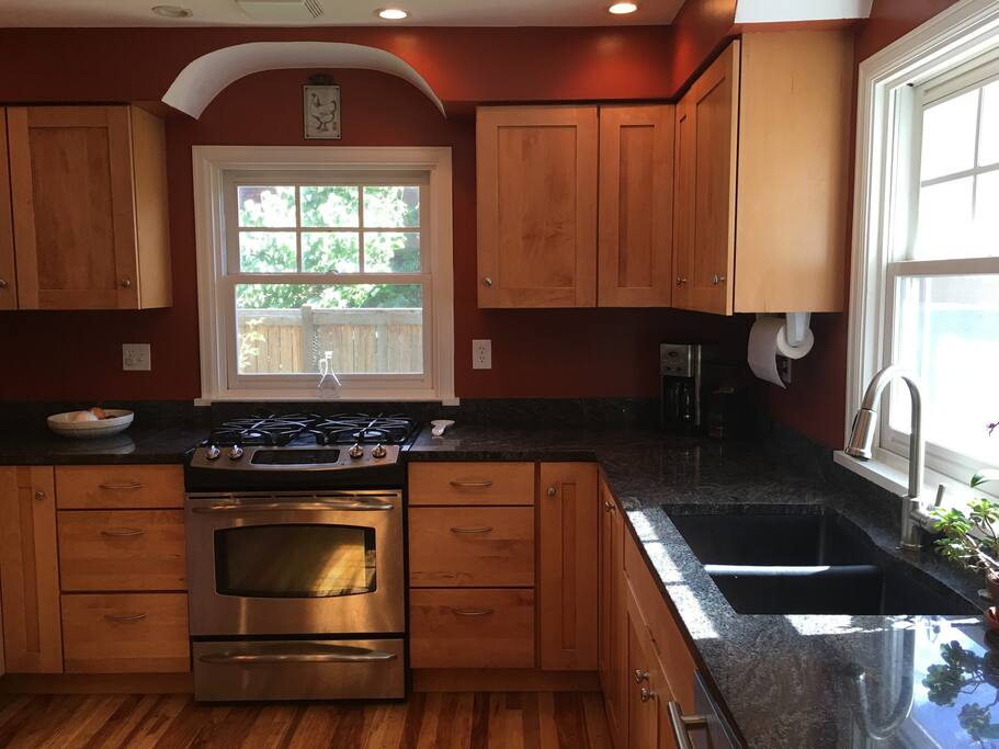 Sunny kitchen complete with every small and large appliance you could need.