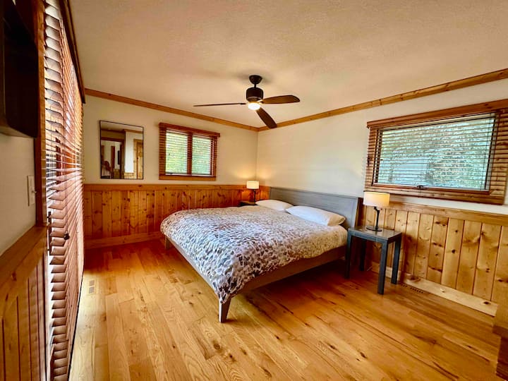 Master bedroom with king bed. Slider to front deck. 