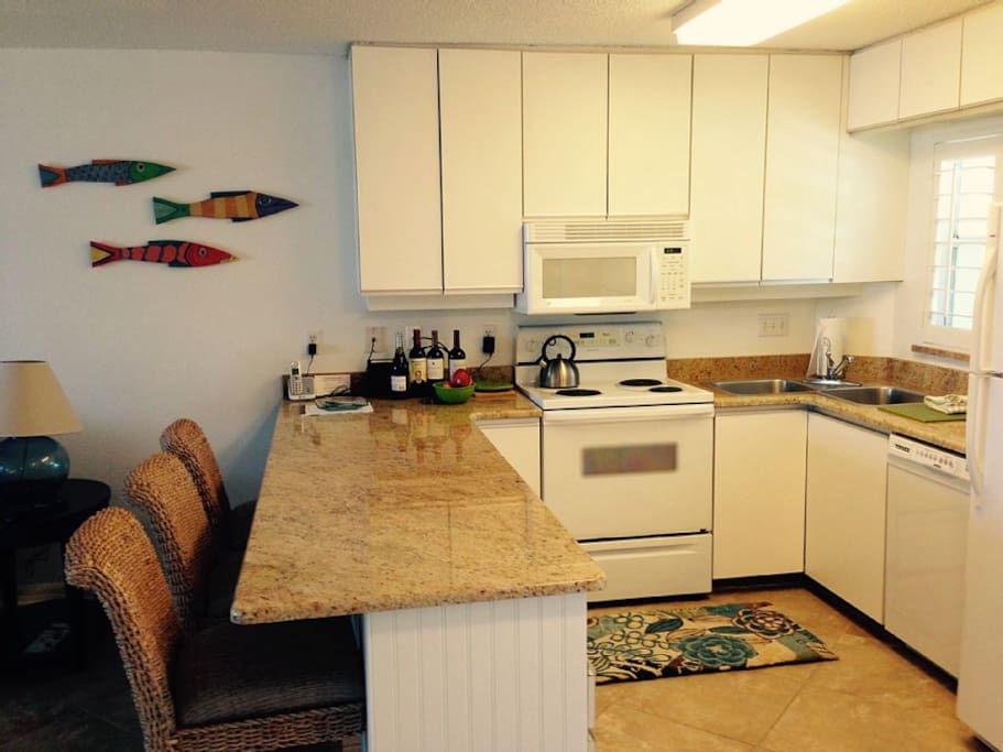 Fully stocked kitchen with outside grilling available.