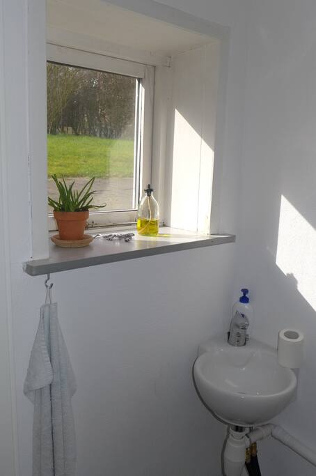The room has its own toilet, the shower and bath is shared with the owner.