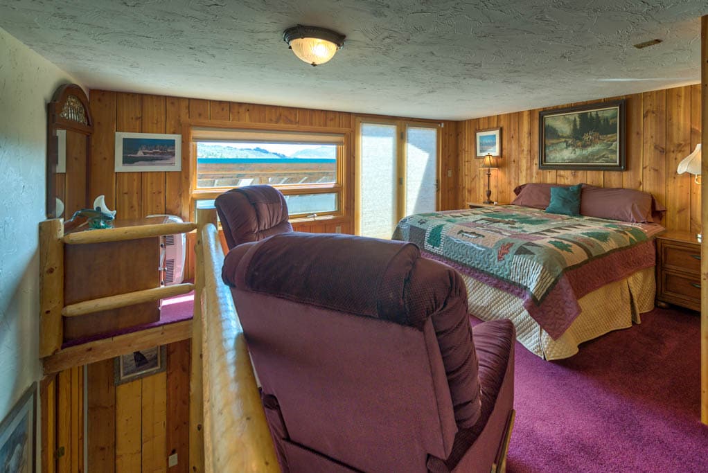 Bedroom 4- One King bed with private deck above Library