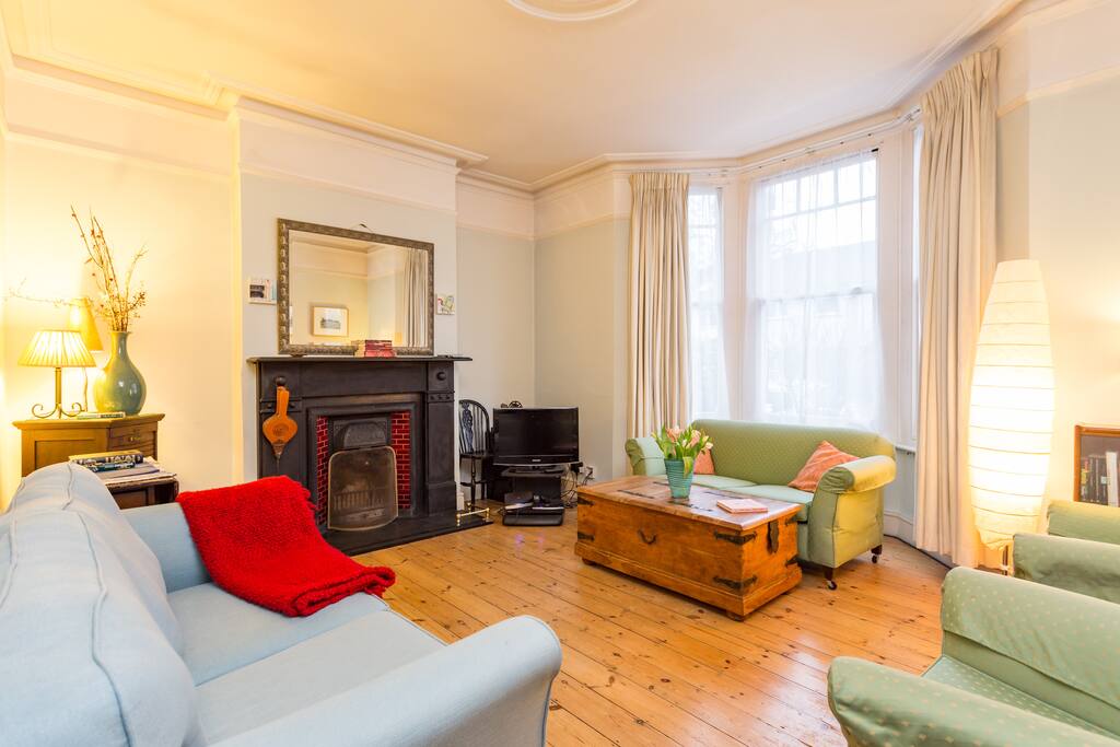 Family living room - there's a TV but we leave out a few board games for you too. Sofa bed comfortable sleeps one - two (if they're small).