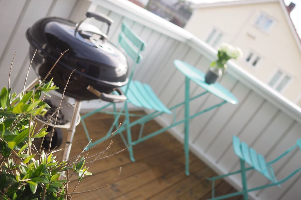 The cozy balcony has a lot of sun.
