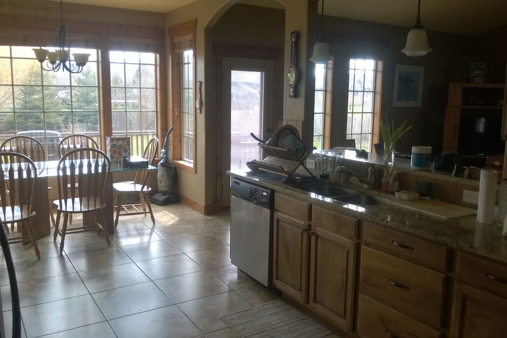 Kitchen with range, microwave, dishwasher stove and large pantry
