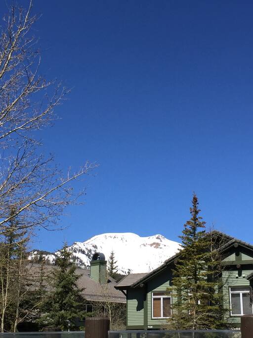 View of Mammoth Mountain from the deck (more green trees in summer/spring)