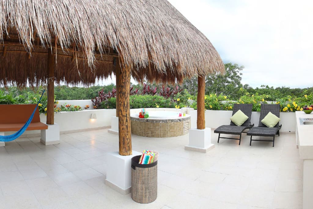 Take a break from the sun under the shade of the palapa