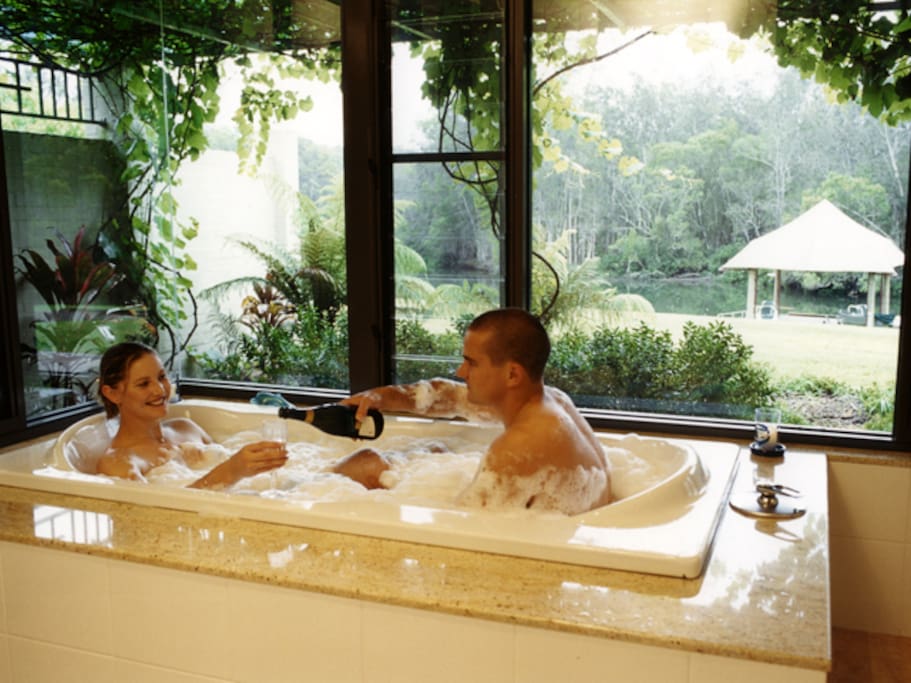 The spa bath overlooking the river