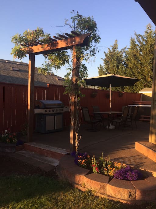 Patio for grilling and hot tubing.
