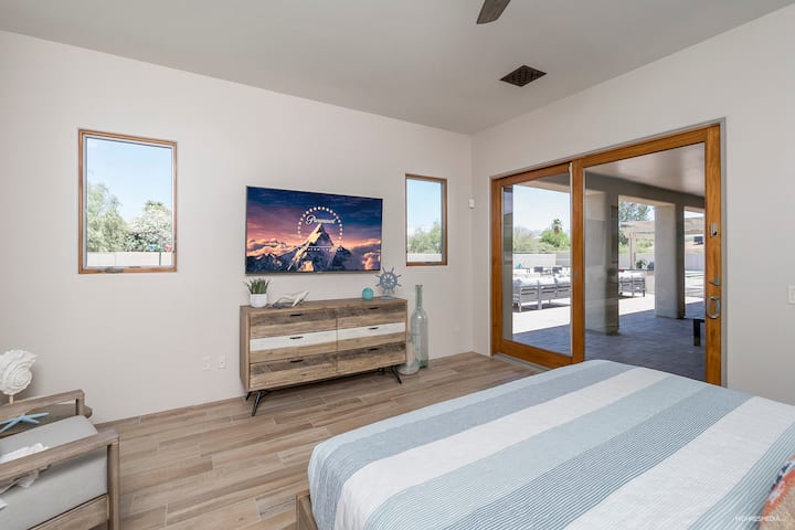 [Bedroom 2] The Surfer room, king bed with ensuite and walk-out to patio