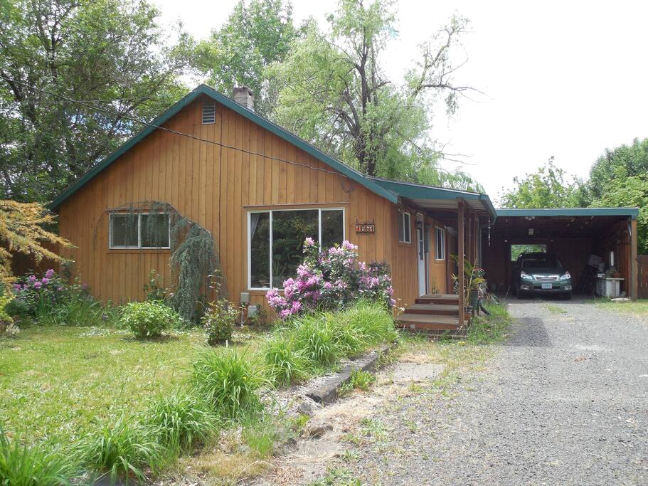 Ample parking for multiple vehicles. Room for RV but only standard outlets available via carport.