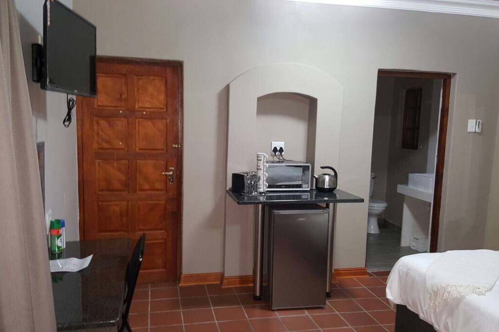 Room 1 kitchenette and workspace