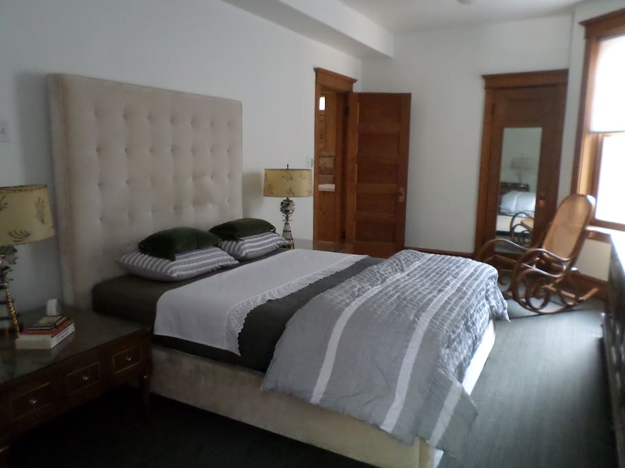 roomy main bedroom with queen bed + large walk-in closet