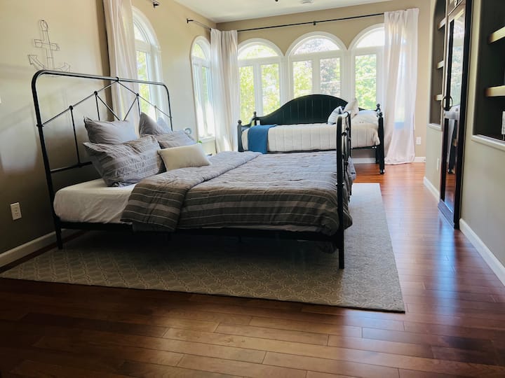 Our cigar room has gotten an upgrade. Now featuring a King sized- platform bed and a single sleeper trundle. 