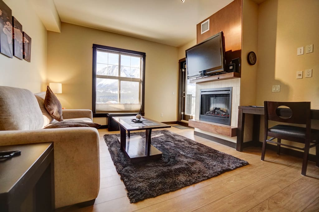 Cozy living room with Cable TV and gas fireplace.