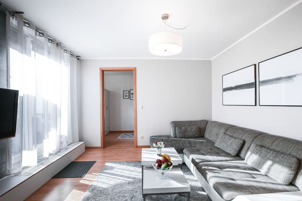 Living room with view to sleeping room