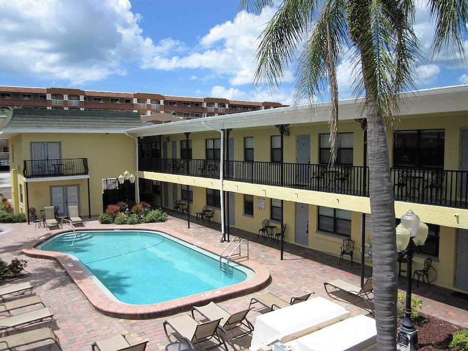 Gorgeous shared courtyard with heated pool, BBQ grill and laundry facility