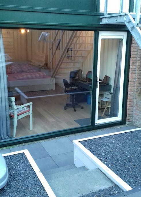 Private entrance via back yard
