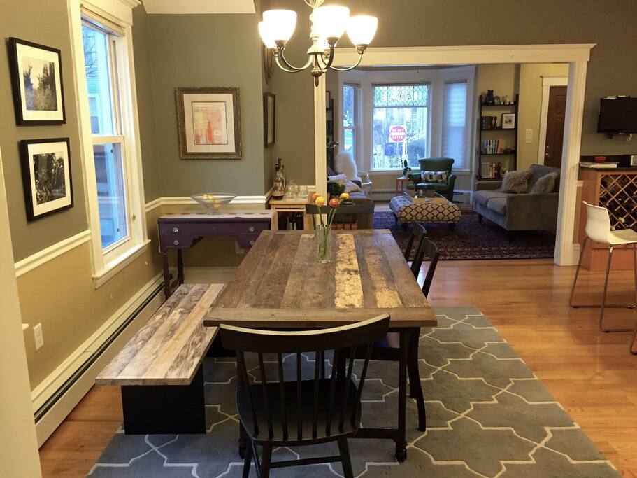 From the mud room in the back, looking across the dining area and kitchen to the front of the house.