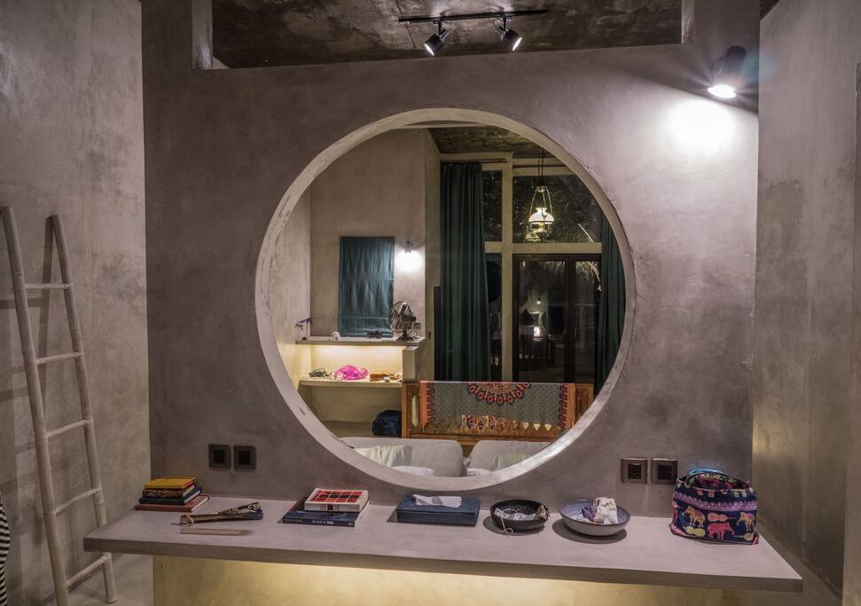 Ground floor rooms are clean, modern and seamlessly part of nature