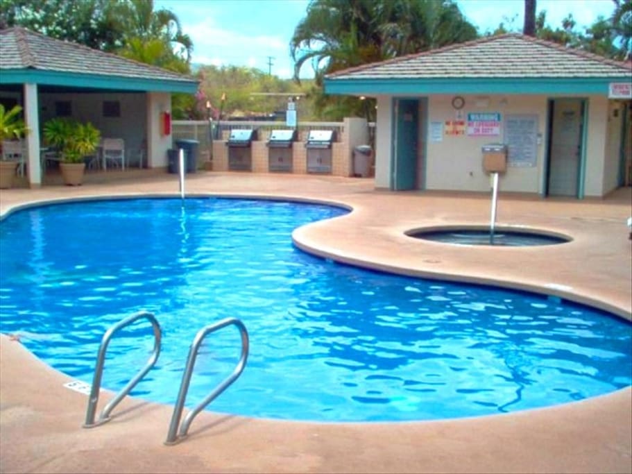 One of 2 identical pool/barbecue areas