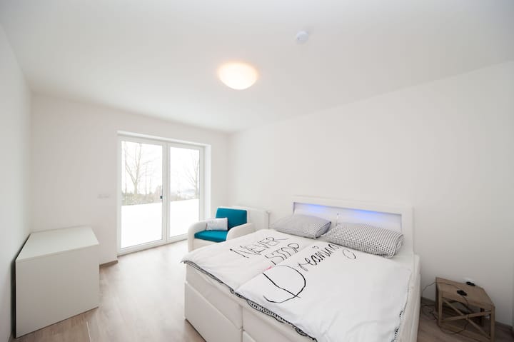 1 of the 3 sleeping rooms downstairs.
Each room has its own bathroom. 