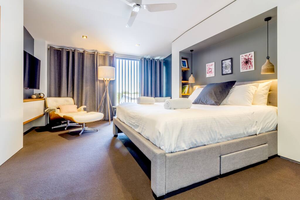 Bedroom1: Master suite with Ensuite, 52 inch Smart TV and lounge area to read a book, just simply relax or watch a movie. Large built-in Robes