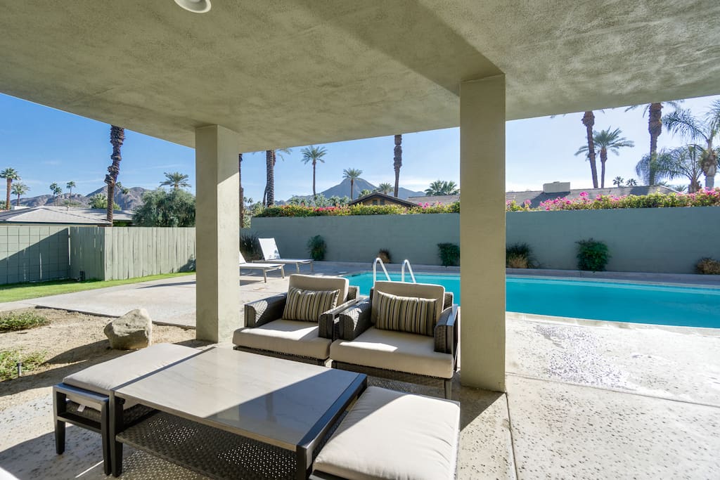 Relax poolside with a book or glass of wine