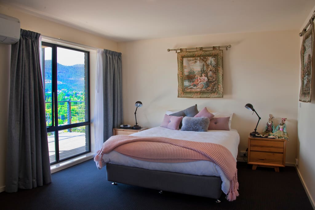 comfy queen bed and great views from floor to ceiling window