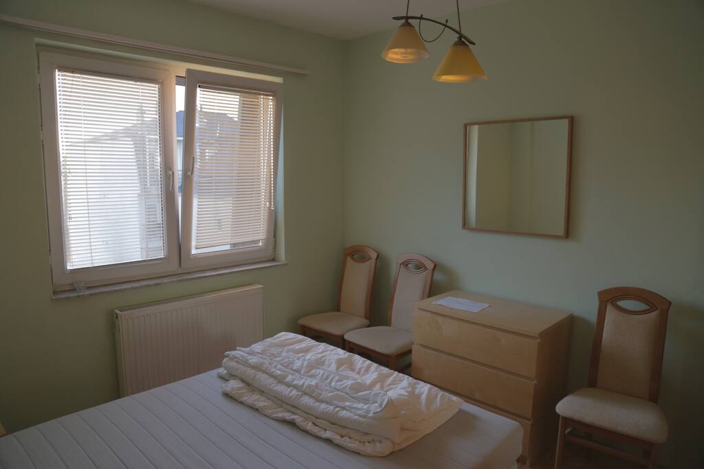 your room with a big bed
