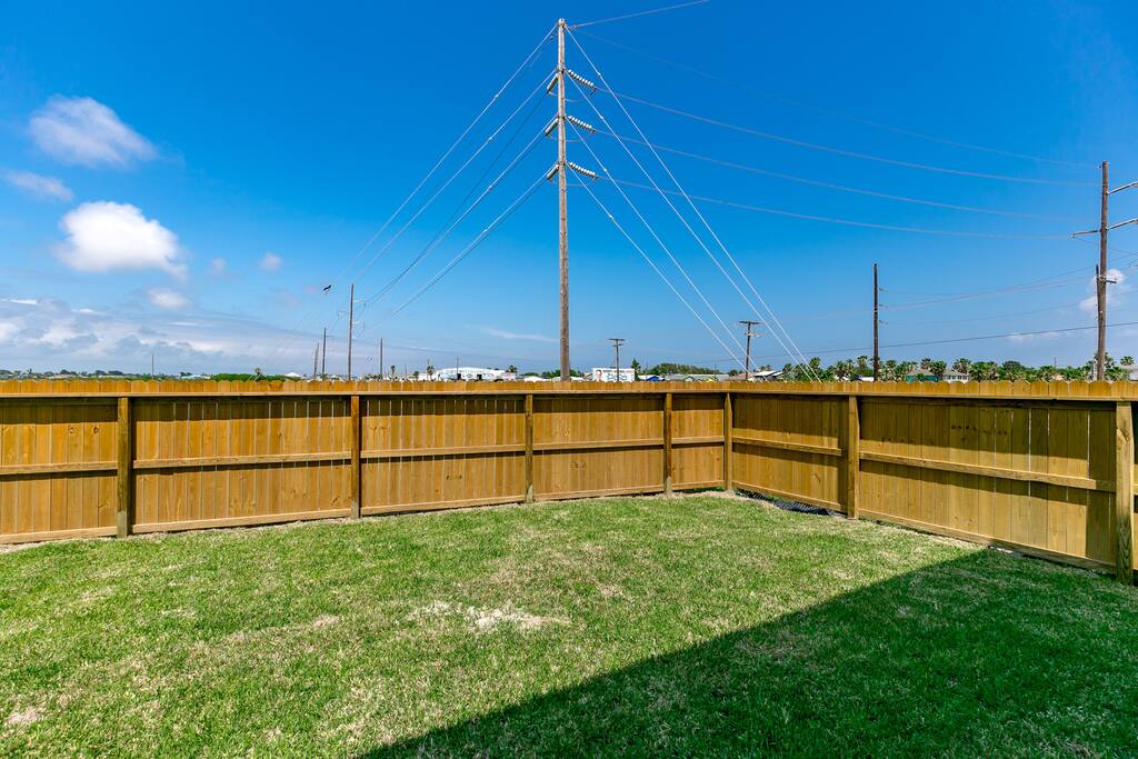 A large fenced-in yard is yours to enjoy.