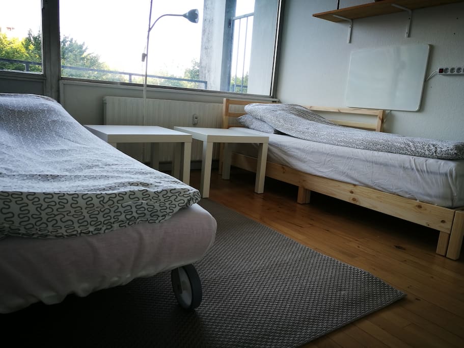 This is how the room looks when the red chair is made into a bed.