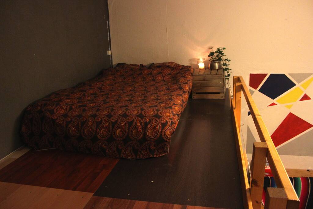 Mezzanine level - sleeping area including double bed