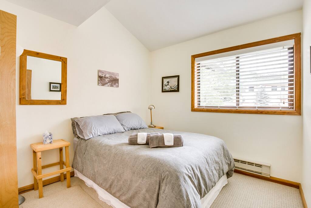 Private bedroom with queen bed and closet