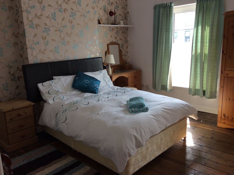 Comfortable double room with plenty of space for clothes.