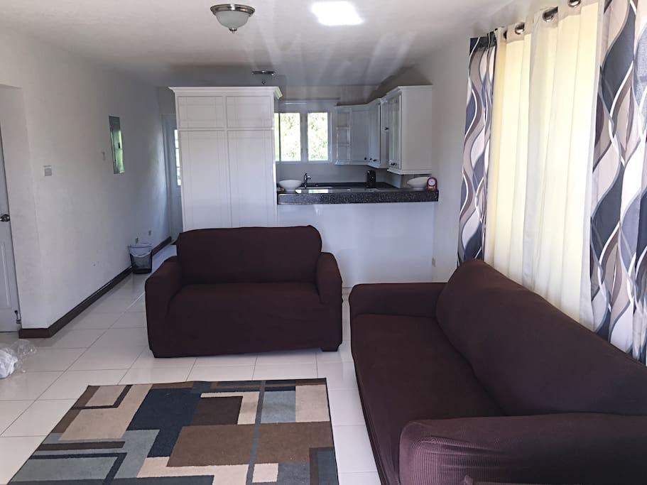 Spacious living room with 3-piece set: 1 chair, 2-seater love seat and 3-seater couch.