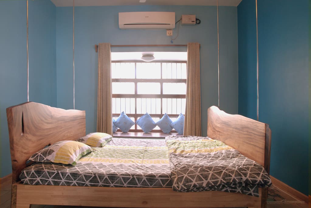 Hanging bed and bay window.