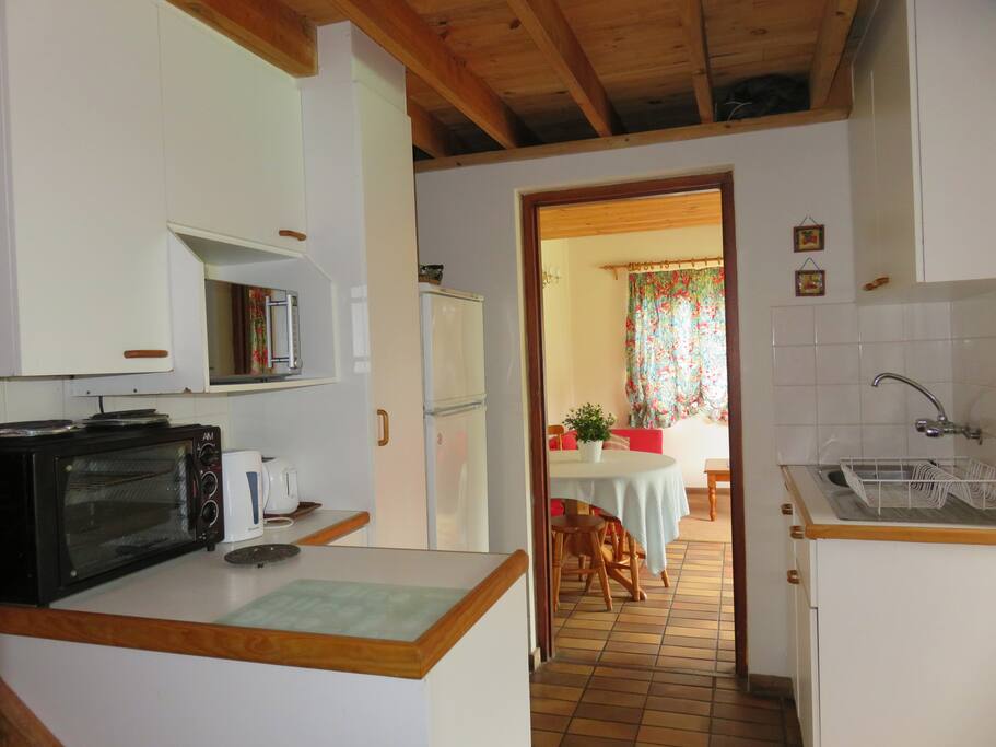 A small equipped kitchen for self-catering purposes..fridge, microwave oven, two plate , counter top stove/oven /grill, kettle, toaster.