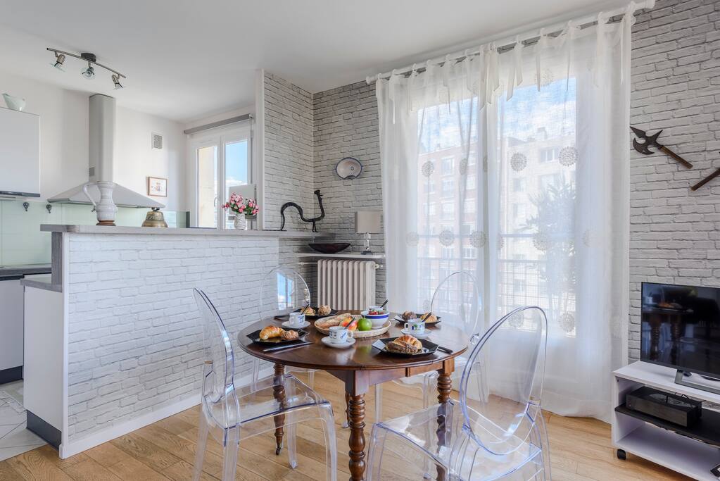 View of the Dining table and Kitchen
