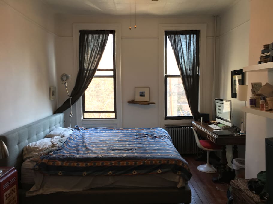This room with the shades drawn.