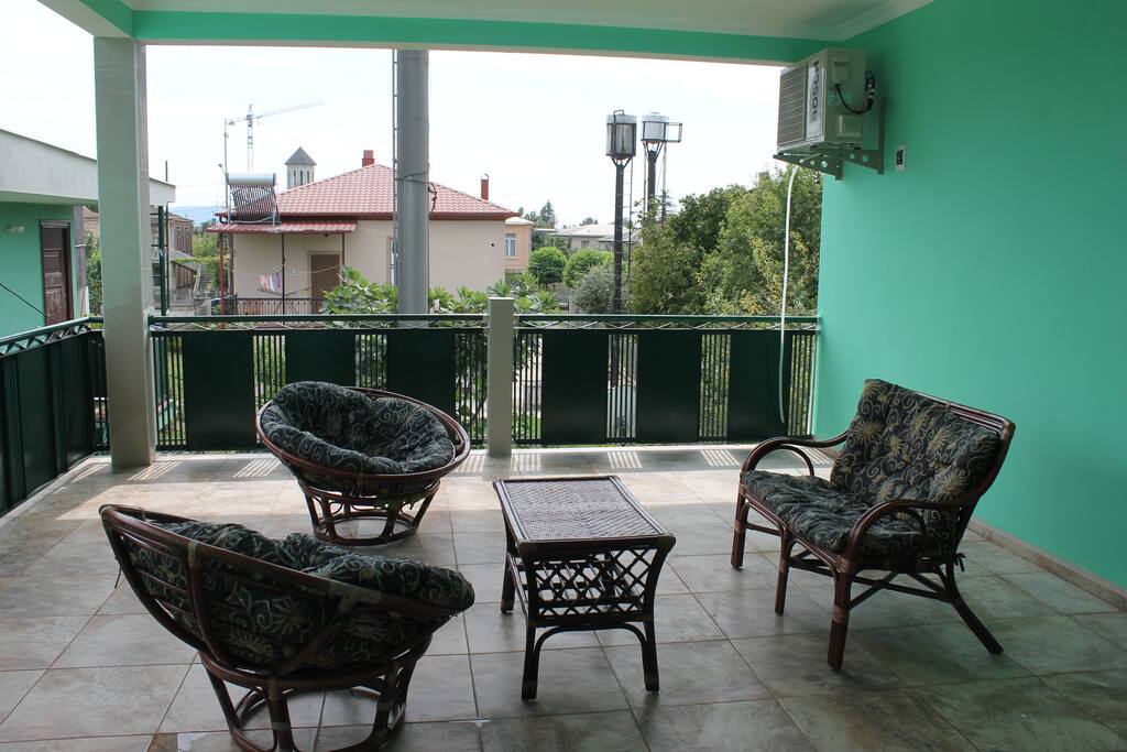 Balcony, where you can enjoy a cup of coffee / tea. Enjoy working as a desk in the corner, as well as taste the dishes offered. . .