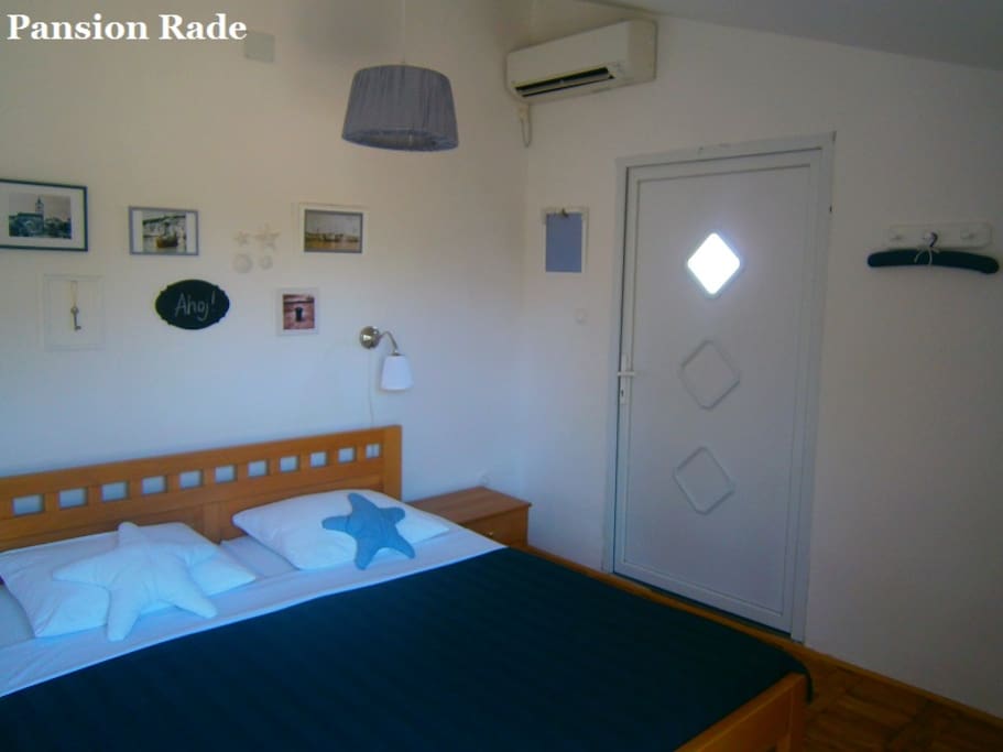 The room is equipped with queen size bed, AC, wi-fi, ...