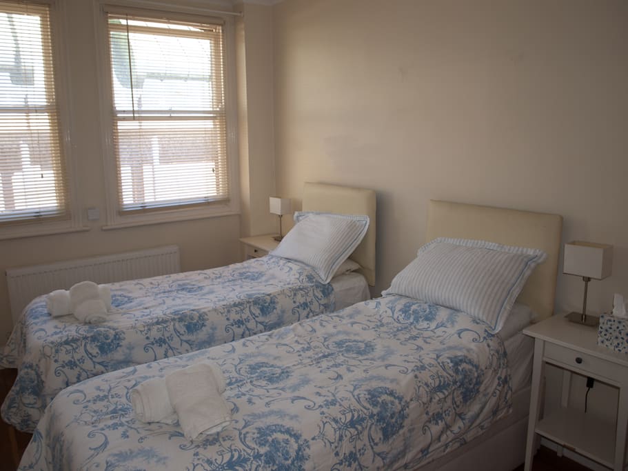 There are two single beds in the second bedroom. They can be arranged as a king size if you request this. It's a big room so there is also space for a folding bed if you are a group of five guests