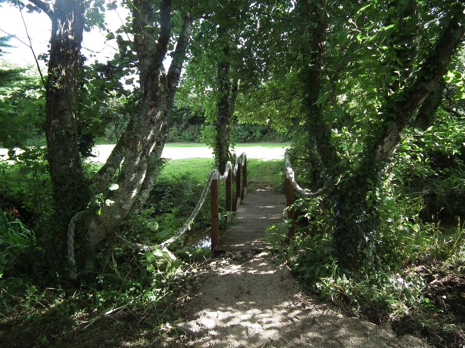 With its own bridge over the stream.