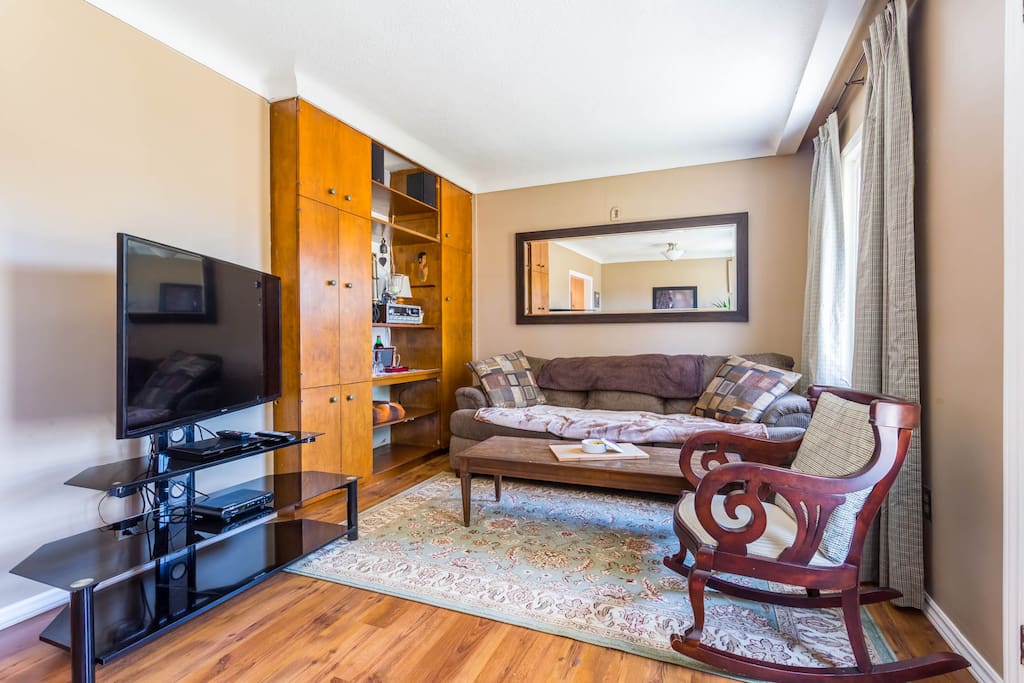 The living area has satellite TV, Netflix, and a comfy bright space to enjoy.
