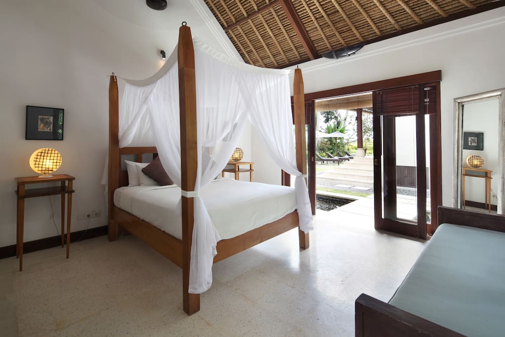 Luxury sleeping in air conditioned comfort with four poster bed, built in wardrobes, safety box and day bed.