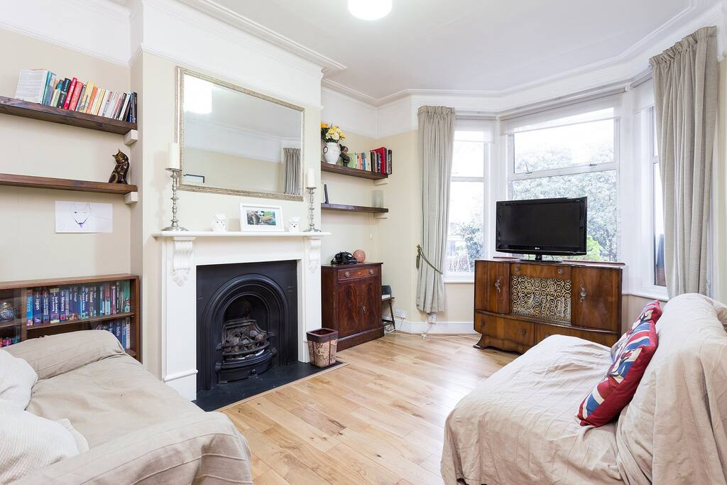 The front room with feature fireplace.