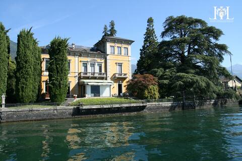 Elegant lakeside villa with pool and boathouse