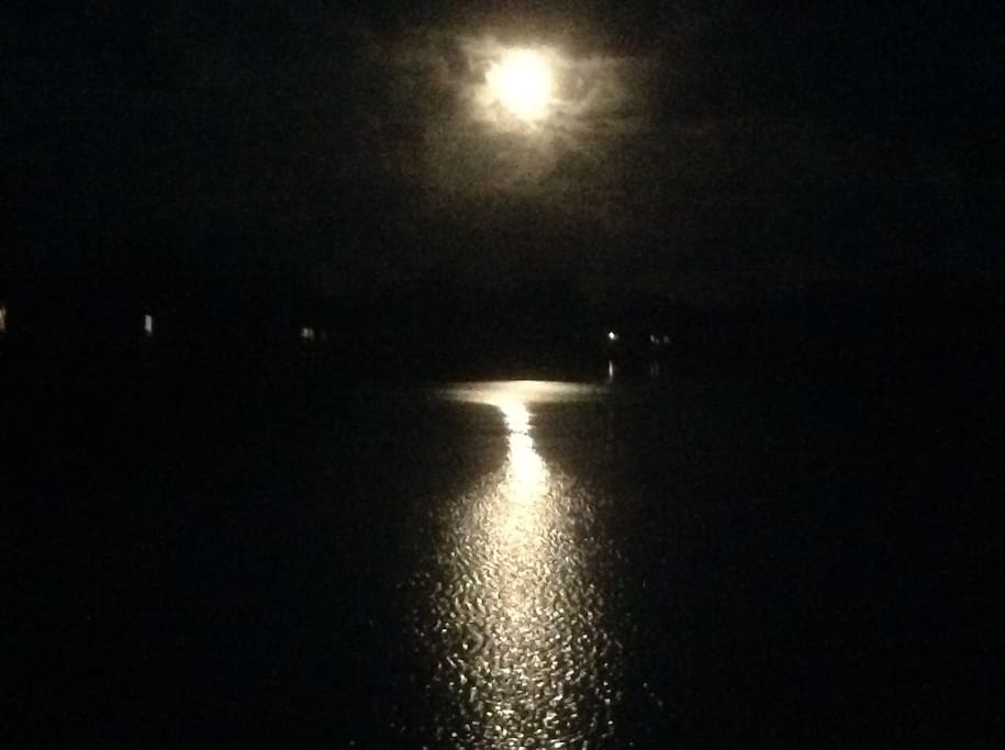 Spectacular moonrise over the water