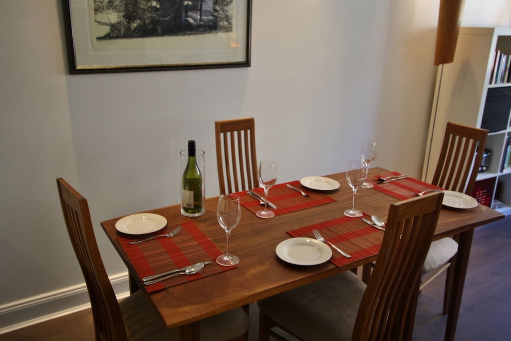 Full wooden dining table in lounge room