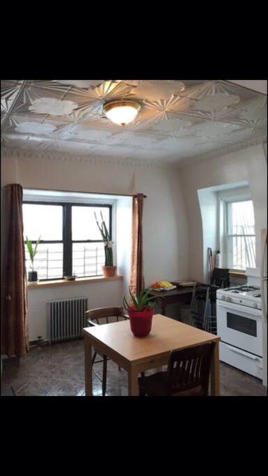 Spacious kitchen with many windows. Enjoy the cross breeze and the views